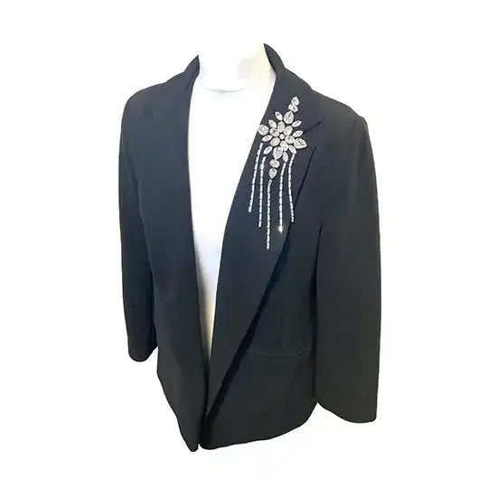 Star design made from Preciosa crystals sewn onto a black jacket 